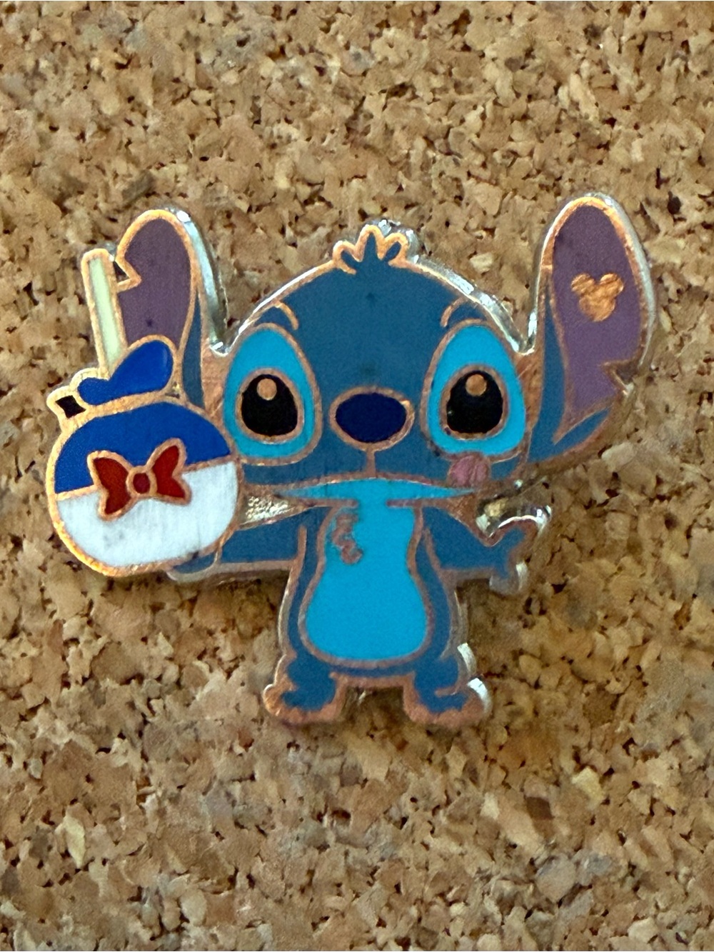 Disney Stitch Blue & Purple Stitch Enamel Pin with Red Bow Accent
Hidden Mickey